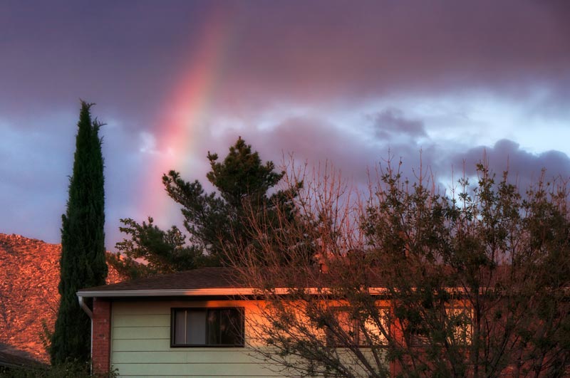 A late afternoon summer rainbow